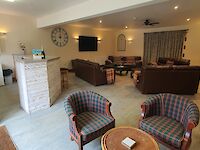 Homely and spacious lounge and bar area within Victoria Albert
