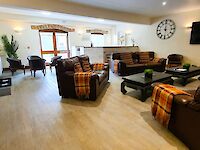 Homely and spacious lounge and bar area within Victoria Albert