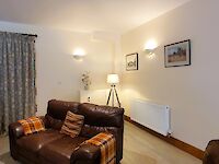 Homely and spacious lounge and bar area within Victoria Albert