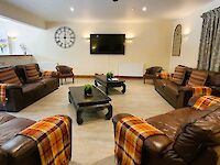 Homely and spacious lounge and bar area within Victoria Albert