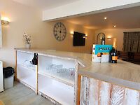 Homely and spacious lounge and bar area within Victoria Albert