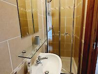 Ensuite shower room within Victoria Albert