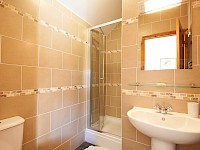 Ensuite shower room, fully tiled throughout