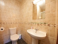 Ensuite shower room, fully tiled throughout