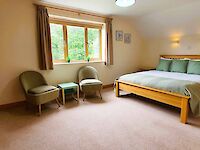 King bedroom with ensuite bathroom in Dorset