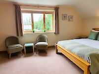 King bedroom with ensuite bathroom in Dorset