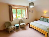 King bedroom with ensuite bathroom in Dorset