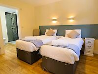 Another of the ensuite bedrooms within Maplewood with this one made up as twin beds