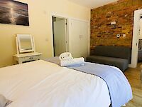 This bedroom in Maplewood can be made up as a king or twin beds and has an ensuite shower room