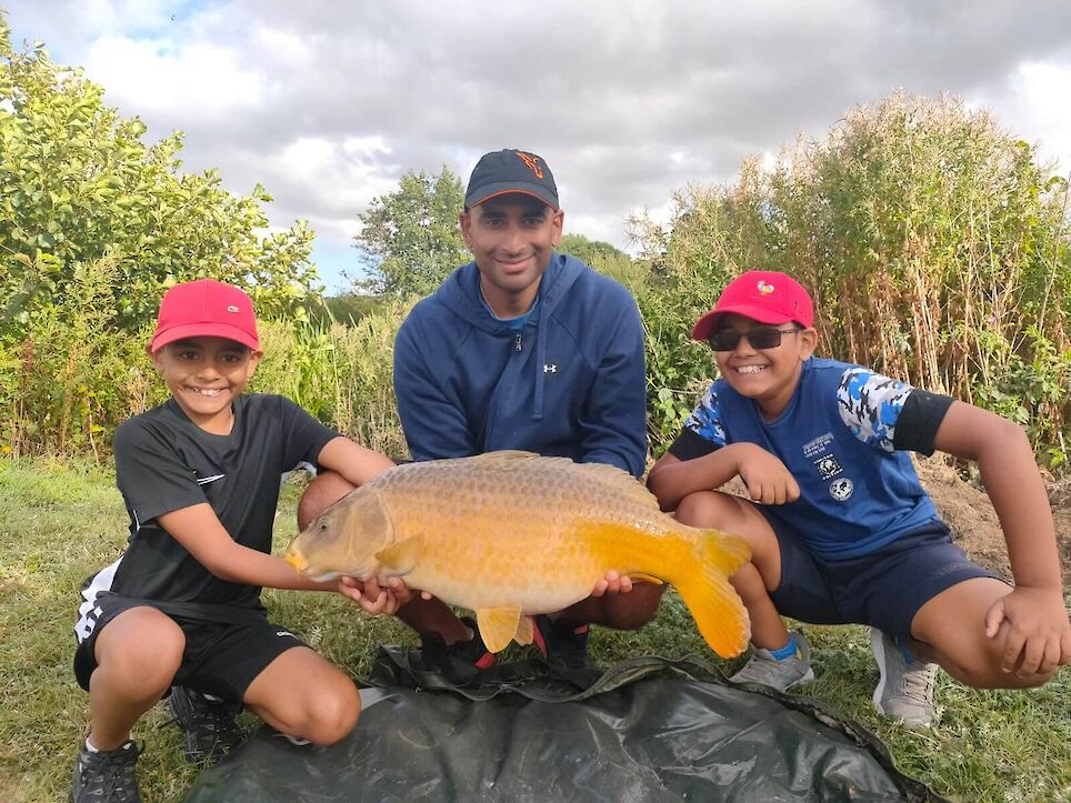 Happy family fishing at The Victorian Barn Dorset