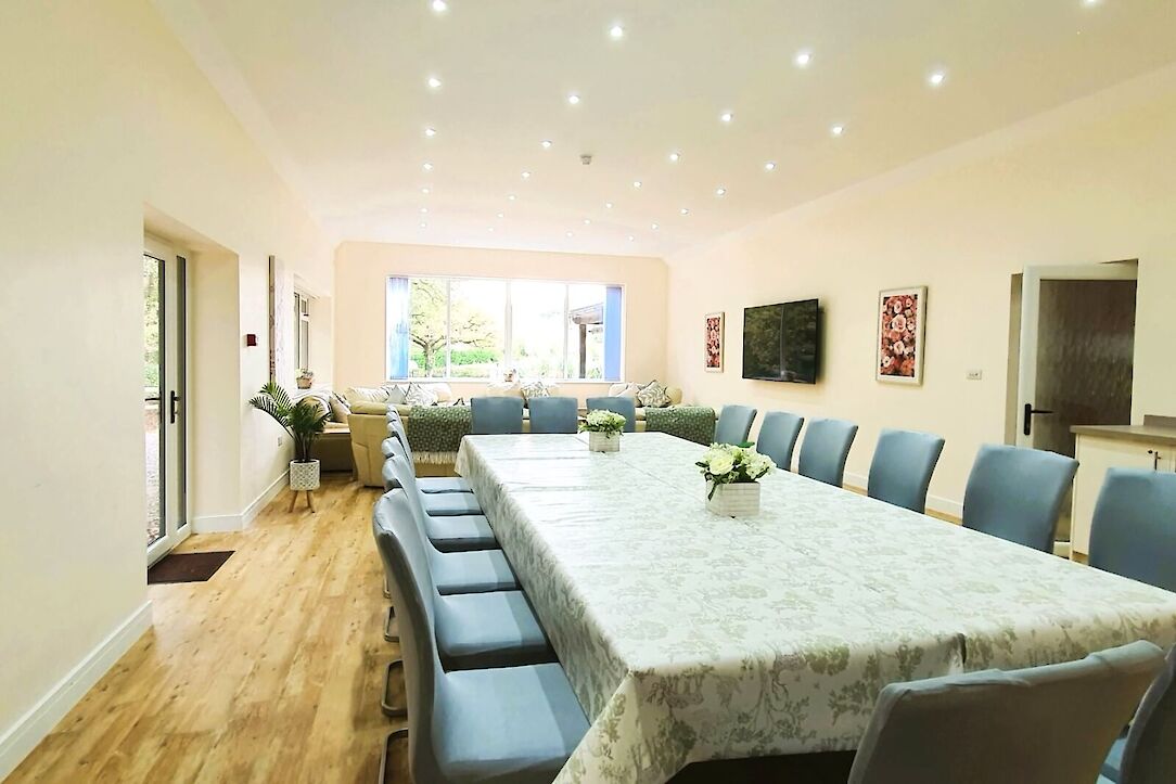 Woodside Retreat dining and lounge space for group accommodation at The Victorian Barn Dorset