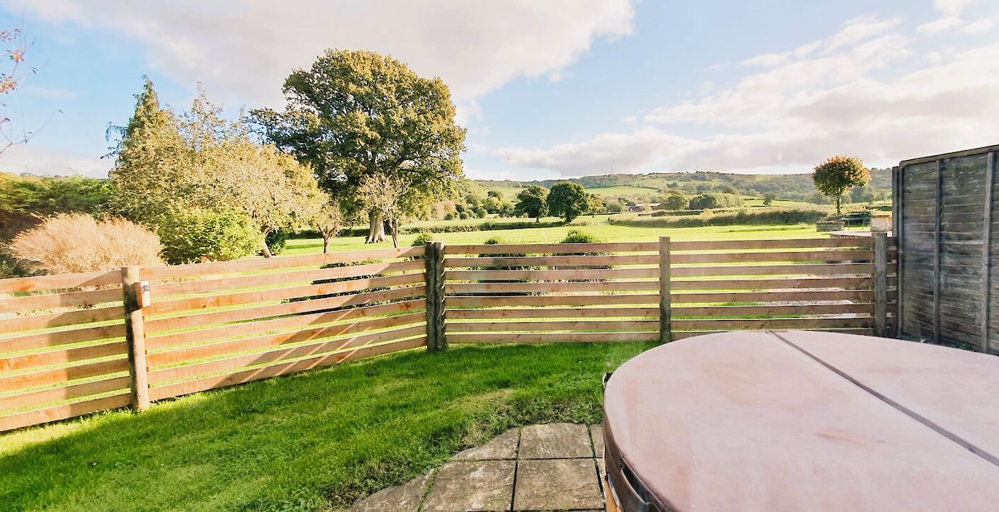 Dog-friendly cottage Dorset with enclosed garden and hot tub at The Stable, countryside views
