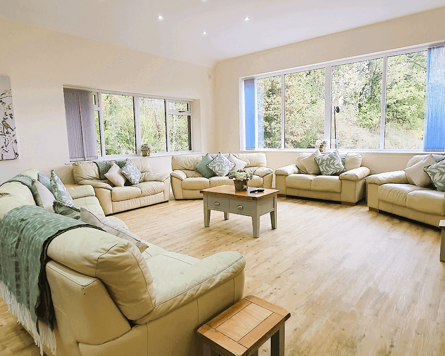 Woodside Retreat dining and lounge space at The Victorian Barn Dorset, perfect for group stays